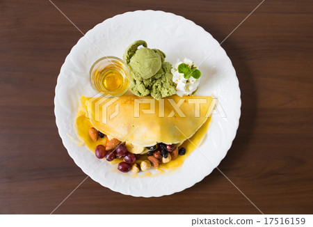 Pancake and fruit with ice cream on table 17516159