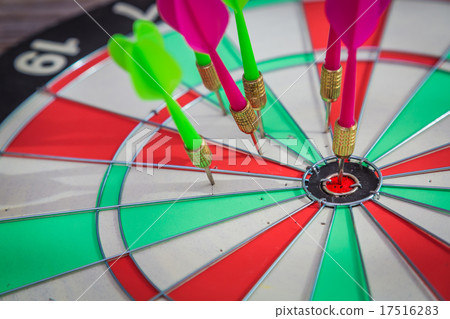 Dartboard on wood wall (miss darts) Dartboard on wood wall (miss darts) 17516283