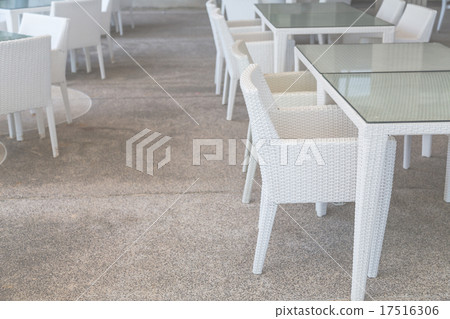 White tables and chairs in restaurant White tables and chairs in restaurant 17516306