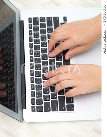 Closeup of business woman hand typing on laptop keyboard 17516310