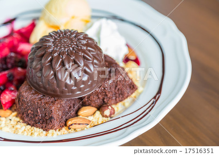 Chocolate cake with fruit peach, black currant, blueberry, apple Chocolate cake with fruit peach, black currant, blueberry, apple 17516351