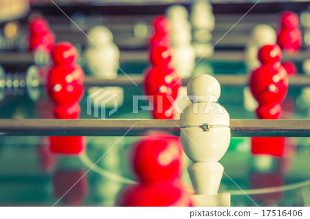 Football table game with red and white player ( Filtered image p 17516406