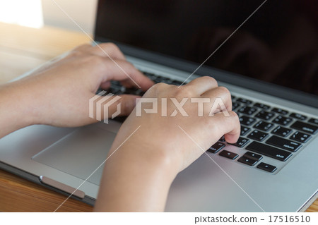 Closeup of business woman hand typing on laptop keyboard Closeup of business woman hand typing on laptop keyboard 17516510