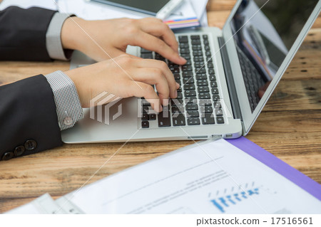 Closeup of business woman hand typing on laptop keyboard Closeup of business woman hand typing on laptop keyboard 17516561