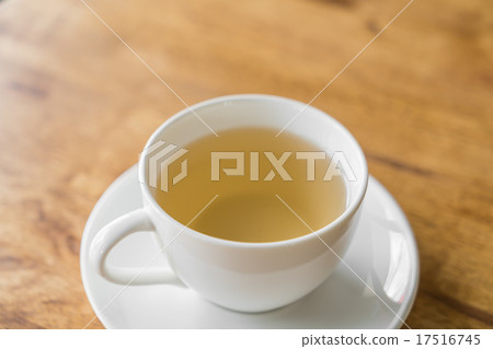 Cup of tea on a wooden table Cup of tea on a wooden table 17516745