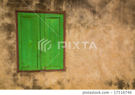 Green window on a old wall ( Filtered image processed vintage e 17516746