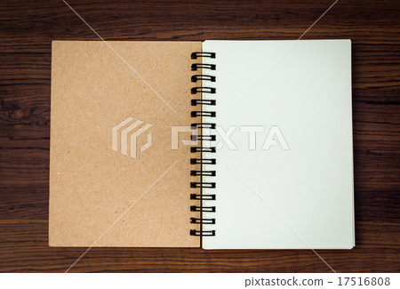 Blank notebook mock up on wood background Blank notebook mock up on wood background 17516808