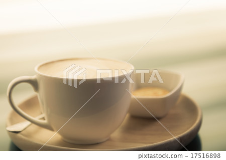 Hot latte art coffee on table ( Filtered image processed vintage 17516898