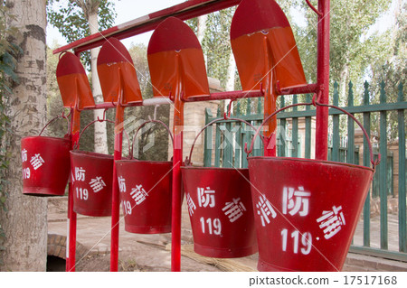 Red waterbuckets and shovels Red waterbuckets and shovels 17517168