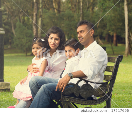 indian family enjoying quality time at outdoor park 17517696