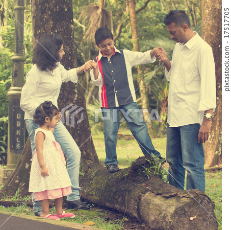 indian family teaching children to climb indian family teaching children to climb 17517705