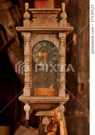An old clock with cobwebs. 17530522