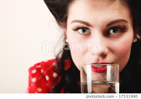 Retro. Pinup girl with glass of water drink Retro. Pinup girl with glass of water drink 17531980