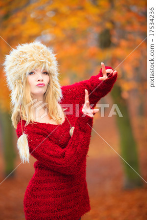 woman in winter clothing fur cap woman in winter clothing fur cap 17534236