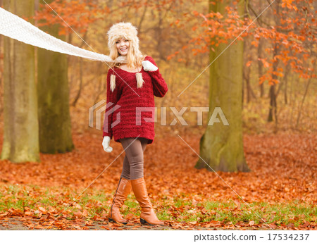 Fashion woman in windy fall autumn park forest. Fashion woman in windy fall autumn park forest. 17534237