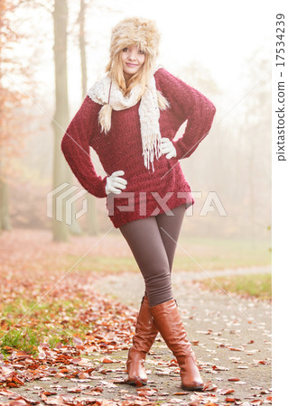 Pretty smiling fashion woman in fur winter hat. Pretty smiling fashion woman in fur winter hat. 17534239