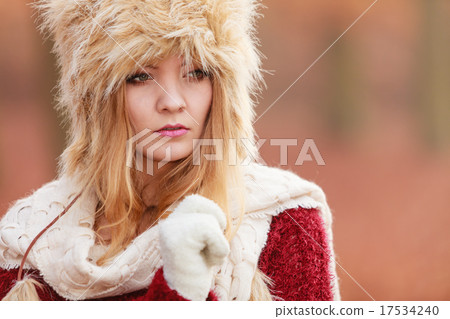Portrait of pretty fashion woman in fur winter hat Portrait of pretty fashion woman in fur winter hat 17534240