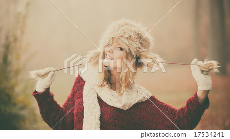Portrait of pretty smiling woman in fur winter hat Portrait of pretty smiling woman in fur winter hat 17534241