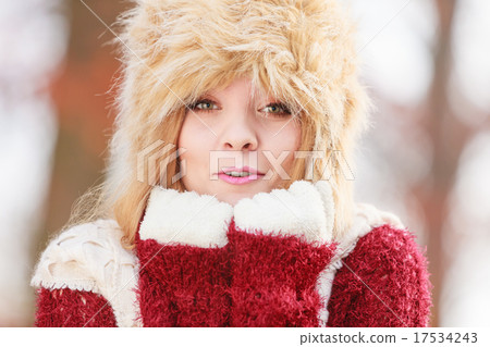 Portrait of pretty fashion woman in fur winter hat Portrait of pretty fashion woman in fur winter hat 17534243