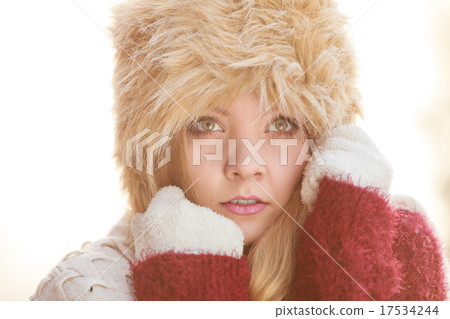 Portrait of pretty fashion woman in fur winter hat Portrait of pretty fashion woman in fur winter hat 17534244