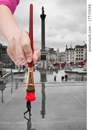 paintbrush paints red umbrella in London paintbrush paints red umbrella in London 17535048