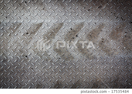Dirty metal pattern and tyre tracks 17535484