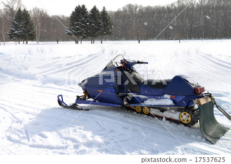 A snowmobile in winter season. A snowmobile in winter season. 17537625