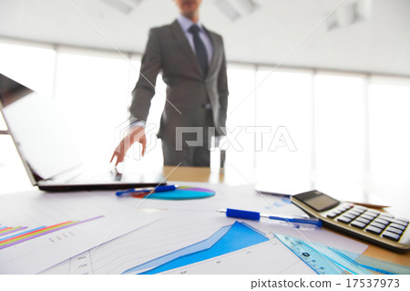 Businessman and documents 17537973
