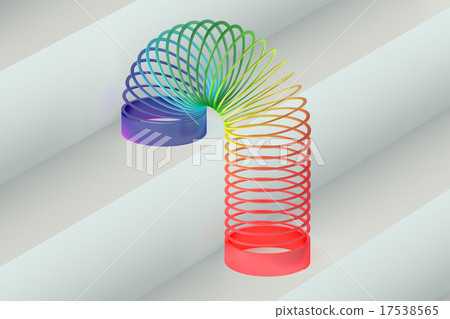 Rainbow colored plastic Slinky toy 17538565