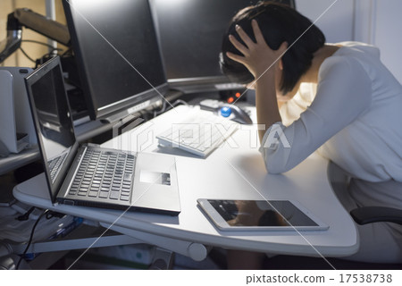A woman with overtime A woman with overtime 17538738
