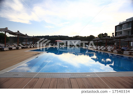 landscape view of the hotel with a pool landscape view of the hotel with a pool 17540334