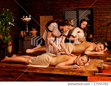 Couple having Ayurvedic spa treatment. 17545762