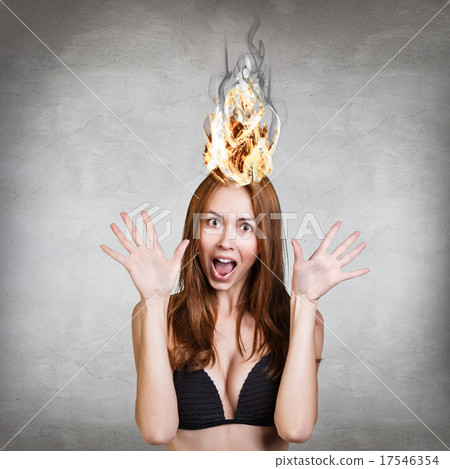 Woman having her brain on fire because of stress Woman having her brain on fire because of stress 17546354