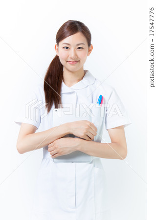 A nurse holding an iPad A nurse holding an iPad 17547776