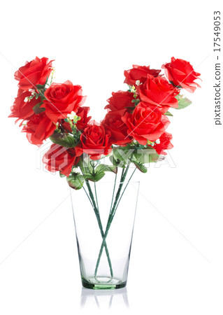 bouquet of plastic red roses in glass jar 17549053
