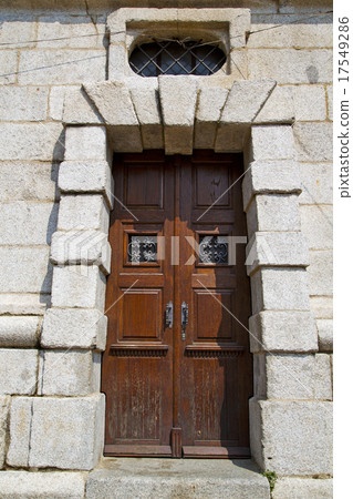 door   in italy  lombardy  window  closed bric  17549286