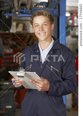 Portrait Of Apprentice Mechanic In Auto Repair Shop 17549885