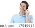 Man Answering Calls In Customer Service Department 17549919