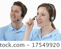 Staff Answering Calls In Customer Service Department 17549920