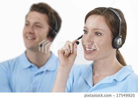 Staff Answering Calls In Customer Service Department Staff Answering Calls In Customer Service Department 17549920
