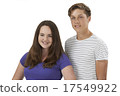 Studio Portrait Of Teenage Couple Against White Background 17549922
