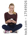 Studio Shot Of Teenage Girl Sending Text Message 17549926