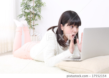 School girl who is amazed at the computer School girl who is amazed at the computer 17552154