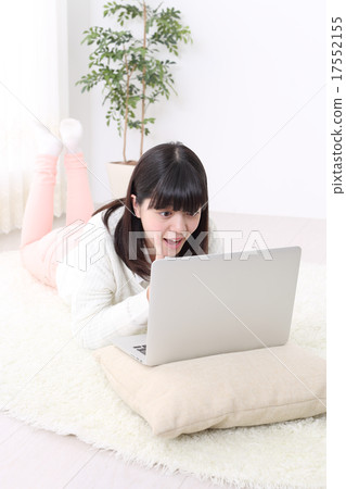 School girl who is amazed at the computer School girl who is amazed at the computer 17552155
