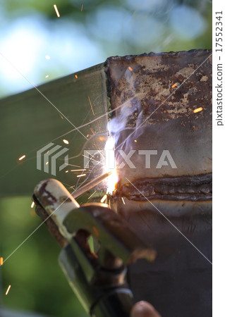 hand of worker welding metal hand of worker welding metal 17552341