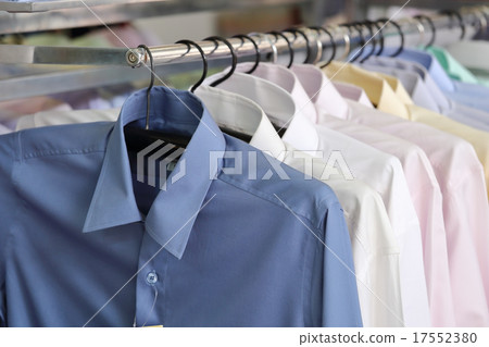 Mens plaid shirts on hangers in a retail store Mens plaid shirts on hangers in a retail store 17552380