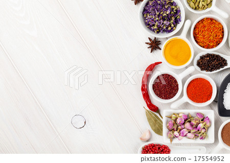 Various spices on white wooden background 17554952