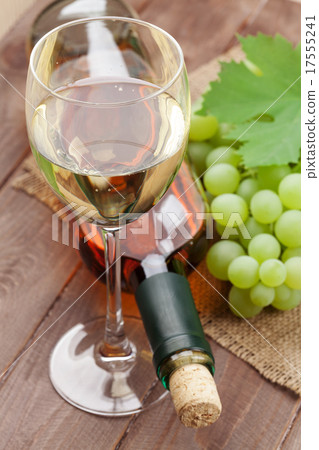 White wine glass, bottle and grapes White wine glass, bottle and grapes 17555241