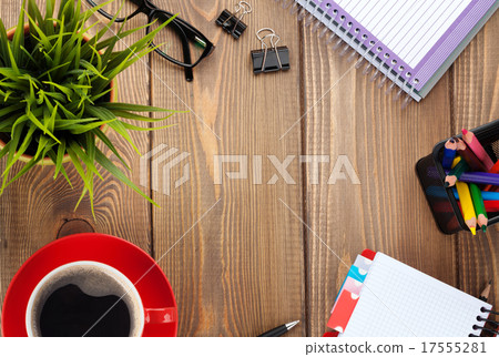 Office table with flower, blank notepad and coffee Office table with flower, blank notepad and coffee 17555281