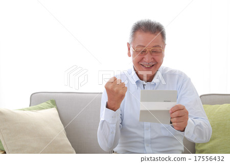 Senior men happy to see passbooks 17556432